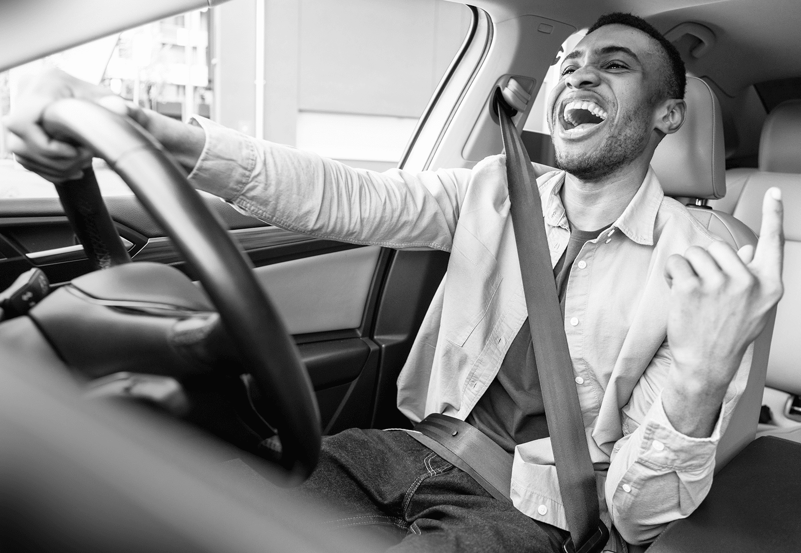 man driving singing